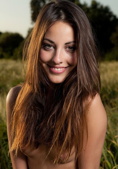 Model Lorena B in A Field With A Flower